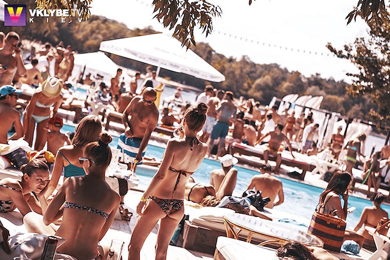 Visitors chill out at the Bora Bora Beach Club in Kyiv. Several beach clubs can be found within city limits.