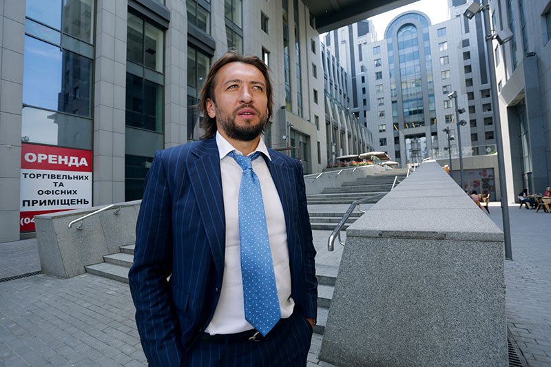 Yuriy Kryvosheya, president of the 83,000 square-meter Toronto-Kiev real estate complex, stands near the entrance to the Holiday Inn hotel, which is part of the development, on June 25. 