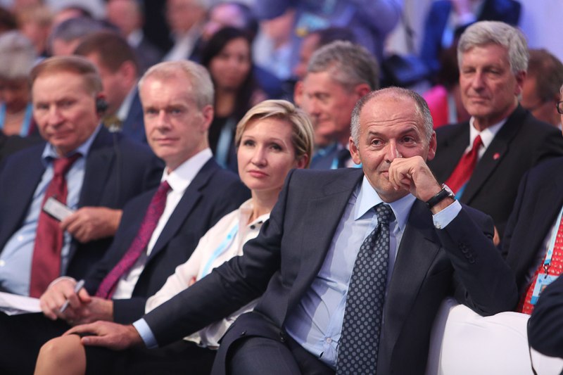 Victor Pinchuk (R), the founder of YES and Olena Pinchuk (2nd R) listen to a panel decision at the 12th Yalta European Strategy Annual Meeting on Sept. 12 in Kyiv.