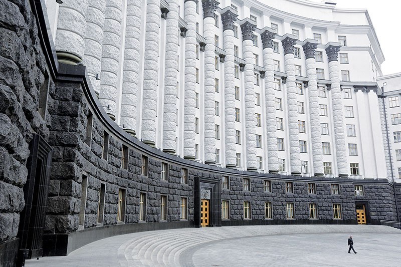 A man walks next to the Cabinet of Ministers of Ukraine on April 24, 2014, in Kyiv.