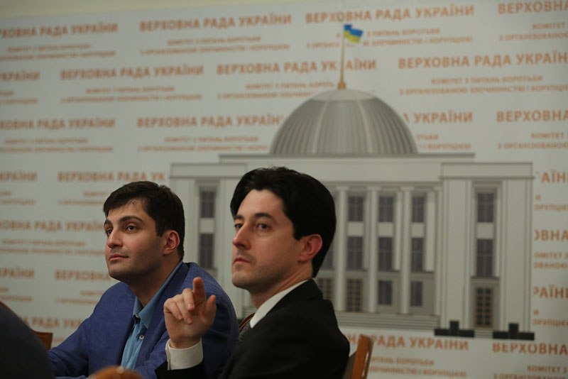 Then- Ukrainian prosecutors Davit Sakvarelidze (L) and Vitaly Kasko at a meeting of the Verkhovna Rada’s anti-corruption committee on July 16.