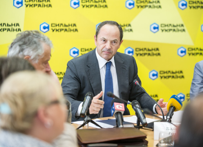Politician and financier Sergiy Tihipko talks to attendees of the roud table organized by his political party Strong Ukraine and titled "Economic patriotism as a basis for national integrity."