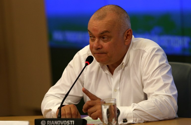 Dmitry Kiselyov, a Russian TV host notorious for his distorted coverage of Ukraine and the West. (AFP)