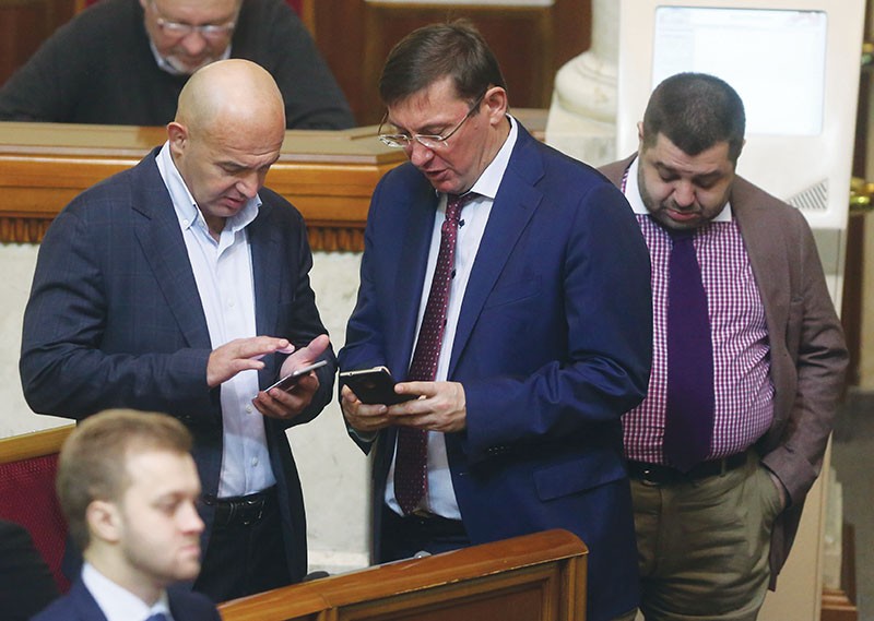 Lawmakers Ihor Kononenko (left) and Oleksandr Hranovsky (right) are seen as President Petro Poroshenko’s grey cardinals and have been accused of corruption and interfering with law enforcement. They deny the accusations. Prosecutor General Yuriy Lutsenko (center), a Poroshenko loyalist, has come under fire for failing to combat corruption or curb the alleged interference of Kononenko and Hranovsky with law enforcement. 