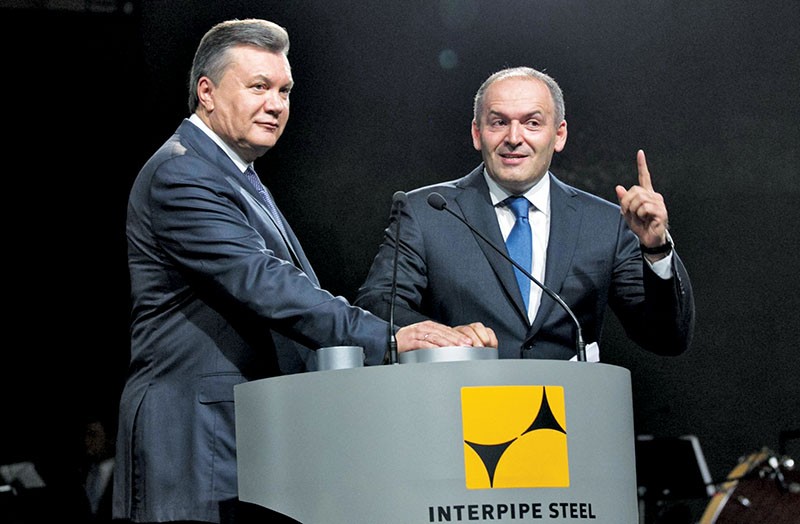 Then Ukrainian President Viktor Yanukovych (L) and founder of the group of companies Interpipe, art patron Victor Pinchuk during the opening ceremony of the metallurgical plant Interpipe Steel on Oct. 4, 2012 in Dnipro (Dnipropetrivsk). (UNIAN)