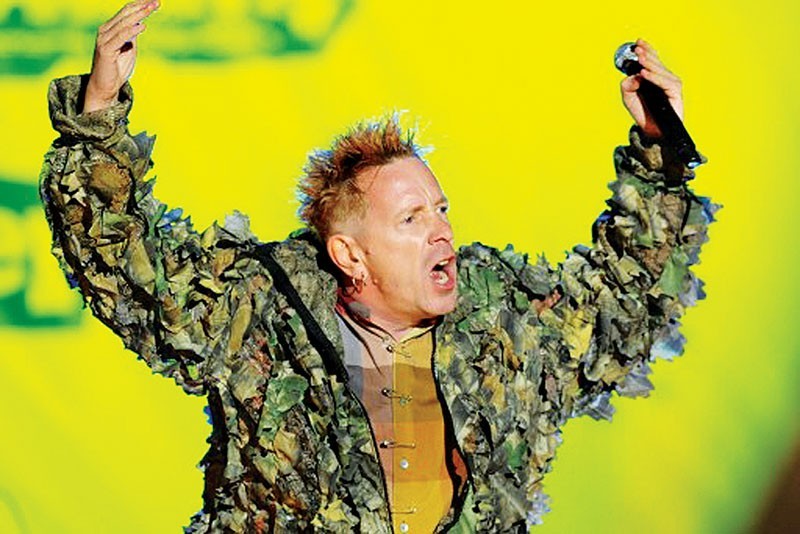 Johnny Rotten, British singer of the Sex Pistols' punk band performs on July 6, 2008 at the Terres Neuvas music festival in Bobital, western France.  AFP PHOTO FRED TANNEAU / AFP PHOTO / FRED TANNEAU