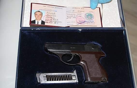 A gun registered on the fugitive Ukraine's Prime Minister, found in the secret appartment in Darnitskyi District of Kyiv on Dec.8.