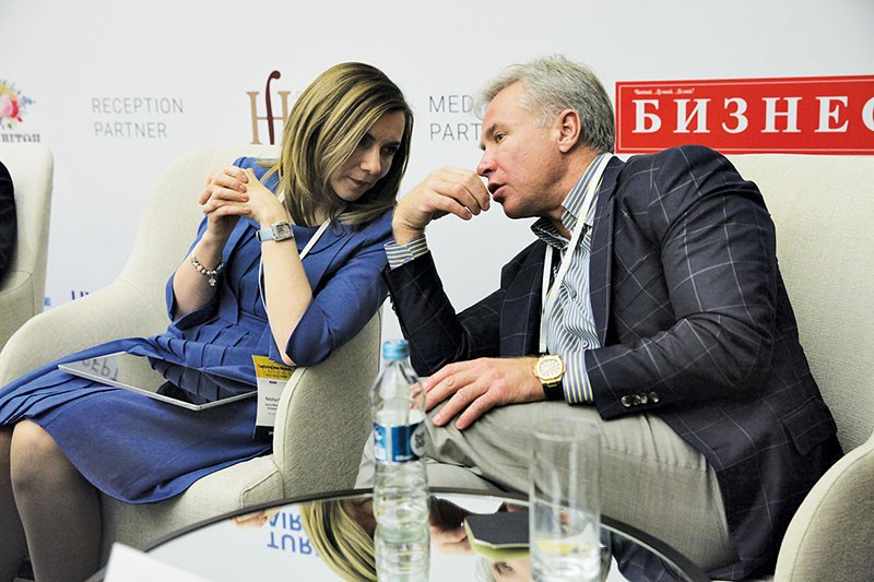 Yuriy Kosyuk talks to Nataliya Mykolska, a deputy minister at Ukraine’s Ministry of Economic Development and Trade, at the Kyiv Post Capturing New Markets conference on March 29. 