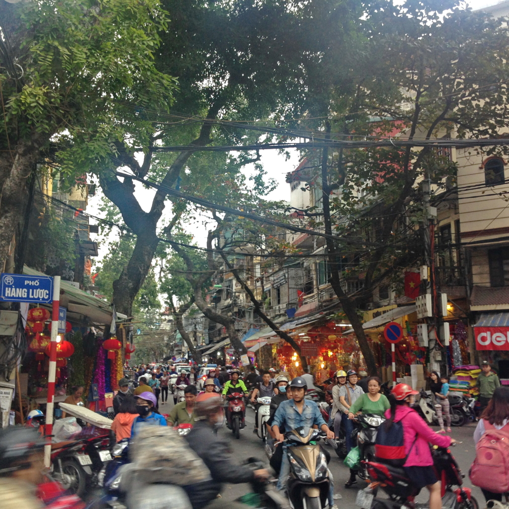 A central Hanoi street scene. Street food is widely available in the busy streets of the Vietnameses capital. (Josh Kovensky)