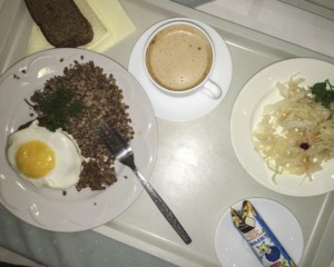 Journalist Iehor had buckwheat, meat chop, fried egg, sauerkraut, bread, curd snack and a capuccino. He says he paid Hr 67 ($2.46).