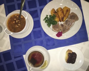 This meal of boiled tongue, grilled pepper, solyanka (spicy and sour soup), eclair and tea would cost Oksana Syroyid, the deputy speaker of the Ukrainian Parliament around Hr 60 ($2.2), but Syroyid told Hrabarska she was treated to it so she's not sure of the exact price.