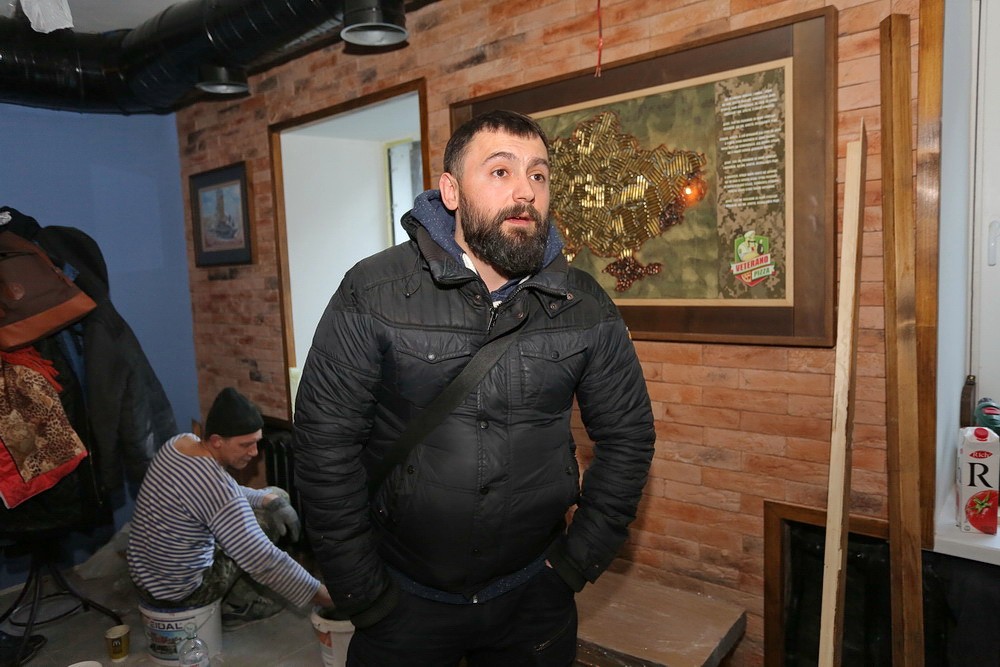Leonid Ostaltsev, Ukrainian Army veteran speaks to the Kyiv Post during the tour in the new Pizza Veterano location on Sofiyivska Street in Kyiv on Jan 25, three days before the re-opening. 