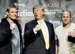 US real estate mogul Donald Trump (C) poses with Mixed Martial Art (MMA) heavyweight fighters US Josh Barnett (L) and Russia's Fedor Emelianenko in New York on June 03, 2009 during a press conference to introduce a World MMA Championship which will take place between the two fighters. The upcoming fight is scheduled to take place on August, 1, 2009 in Anaheim, California. 