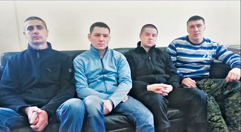 Four former Berkut riot police officers - Vitaly Honcharenko, Vladyslav Masteha, Artem Voilokov and Oleksandr Kostyuk - fled to Russia on April 9-11 after being charged with murder, torture or assault. They recorded a video in Russia denying the charges against them. (Screenshot from video)