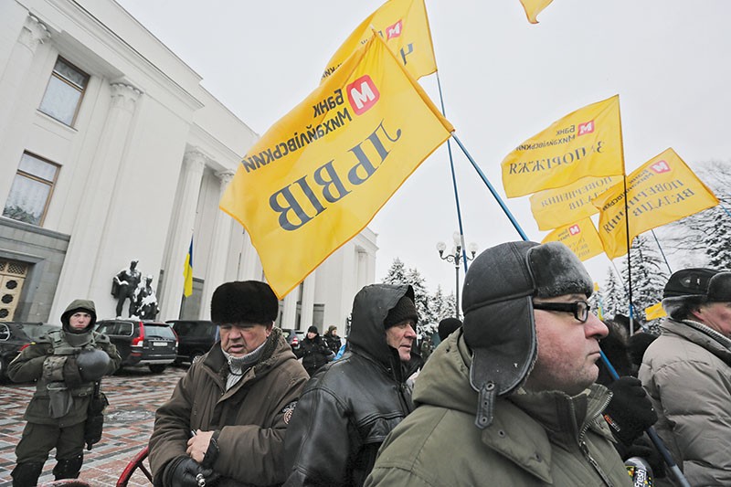 Defrauded depositors from Bank Mikhailivsky protest outside of the Ukrainian parliament on Feb. 7. Arsen Marinushkin, a Kyiv lawyer, has represented the group in court.