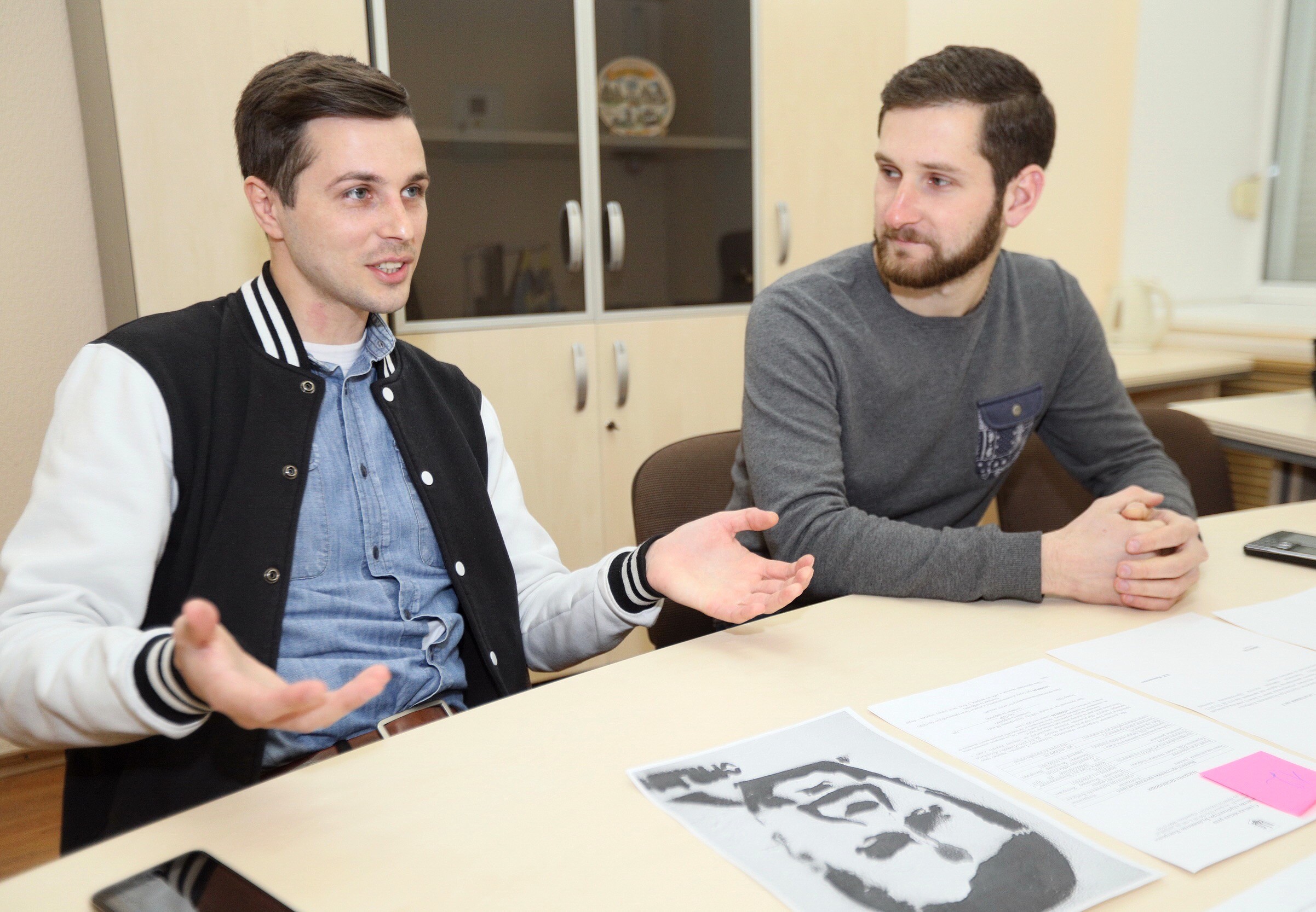 Volodymyr Nykonenko (L) and Ihor Hannenko talk to the Kyiv Post on April 1. 