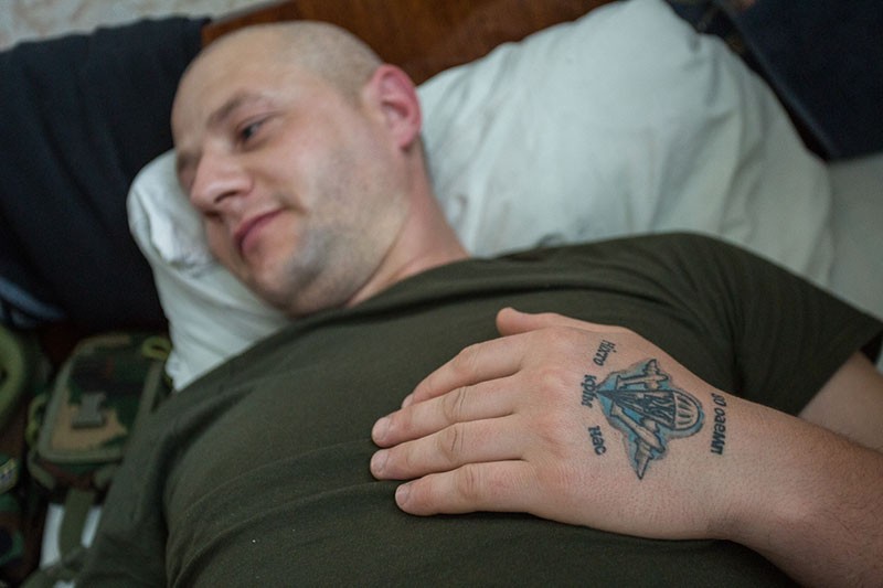 A Ukrainian paratrooper rests in the Pokrovsk military hospital on May 15. 