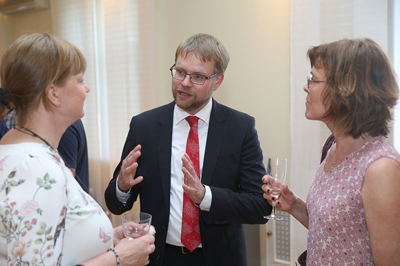 Sweden’s Ambassador to Ukraine Martin Hagstrom speaks with guests in the ambassador’s residence on June 5 in Kyiv.