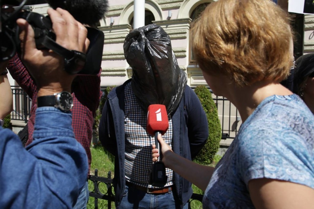 Journalists protest next to the embassies of Azerbaijan and Georgia in Riga, Latvia, on June 15 to demand the release of Azerbaijani reporter Afgan Mukhtarly, who was abducted from Georgia on May 29 and jailed in Azerbaijan.