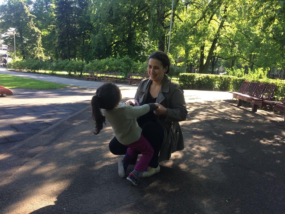 Leyla Mustafayeva, the wife of jailed Azerbaijani journalist Afgan Mukhtarli, plays with their three-year-old daughter Nuray in Riga, Latvia, on June 14. 