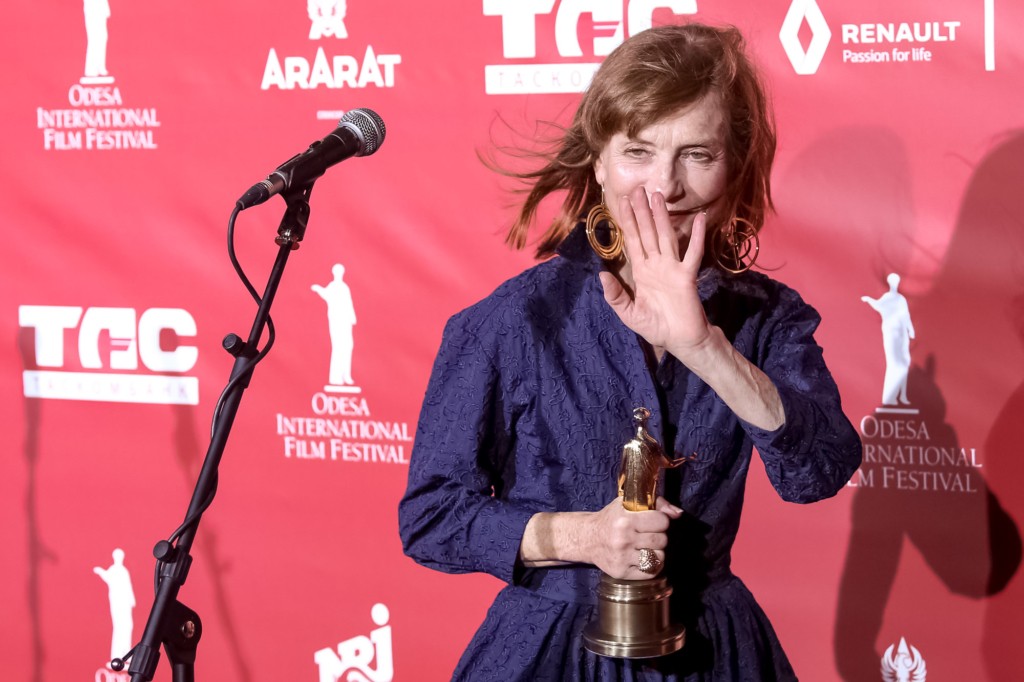 French actress Isabelle Huppert poses to press after receiving the Lifetime Achievement award of the Odesa International Film Festival on July 22 in Odesa. (Kostyantyn Chernichkin)