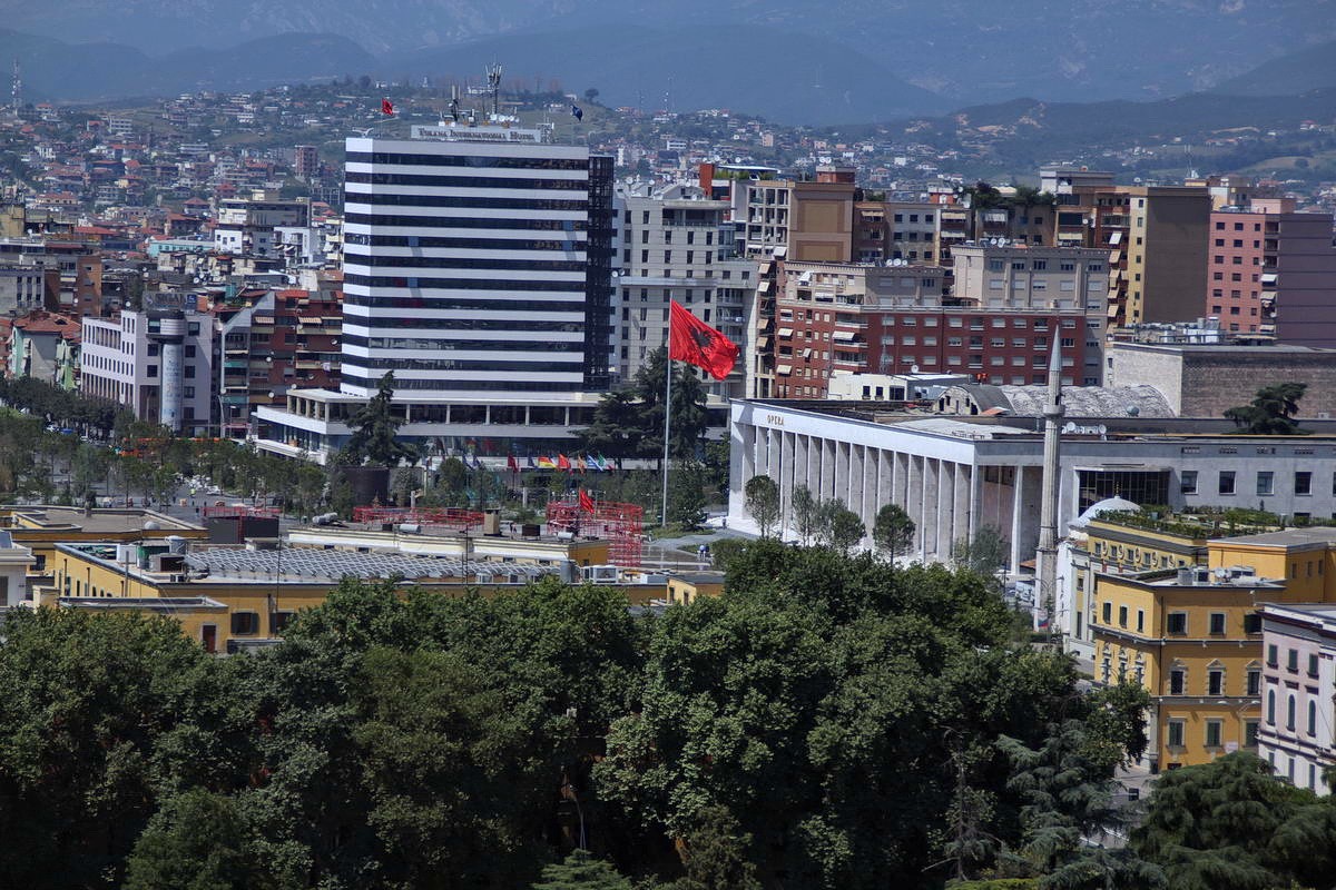 Albanian national flag waves at Skanderbeg Square in the center of Albanian capital Tirana. (photo by Igor Sudakov)