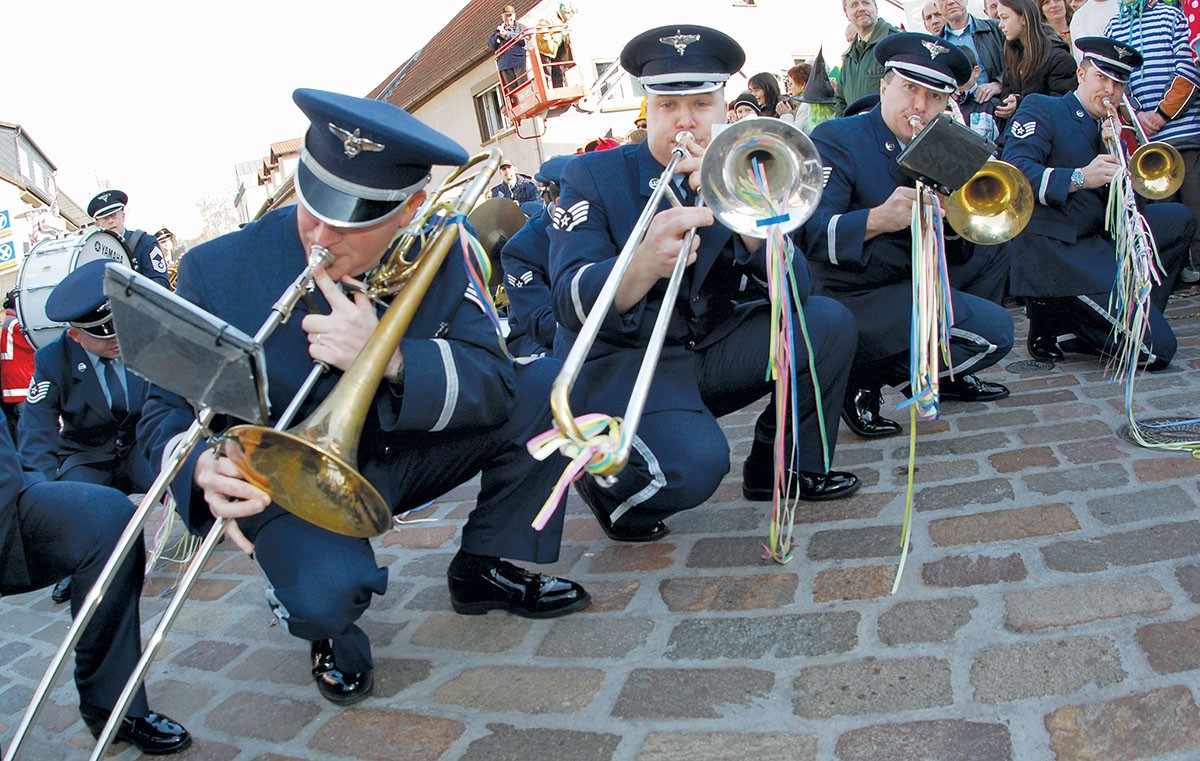 070220-F-3266B-004 Members of the USAFE Band play and dance to Glen Miller’s “In the Mood” for spectators at the Fasching Parade in Ramstein Village, Germany. The parade marks the end of Fasching and the beginning of the Lenten season. (US Air Force photo by SSgt Dan Bellis)