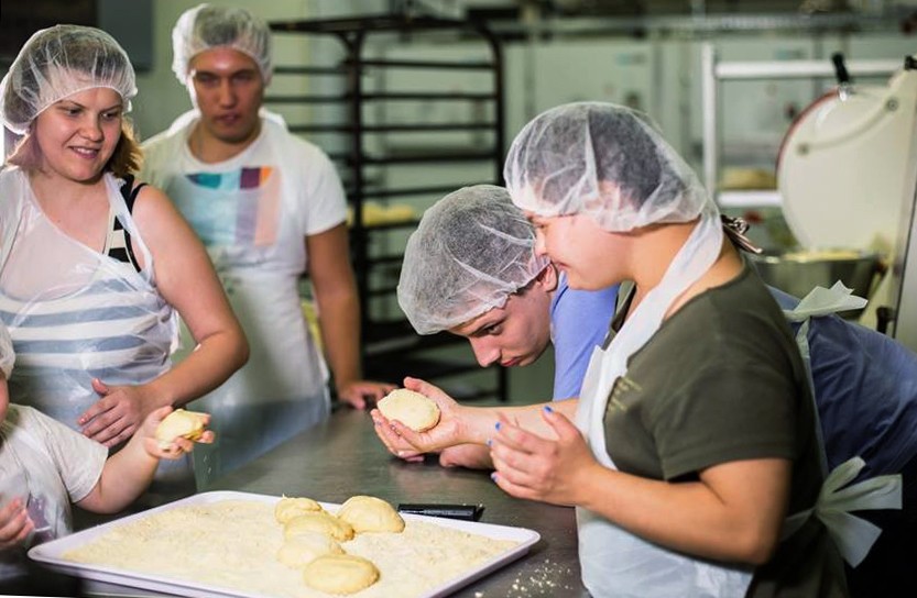 Children bake in the charitable social and rehabilitation center called Rodyna (Family) in Kyiv. 