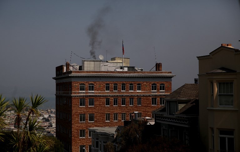 Black smoke billows from a chimney on top of the Russian consulate on Sept. 1, 2017 in San Francisco, California. In response to a Russian government demand for the United States to cut its diplomatic staff in Russia by 455, the Trump administration ordered the closure of three consular offices in the San Francisco, New York and Washington. 