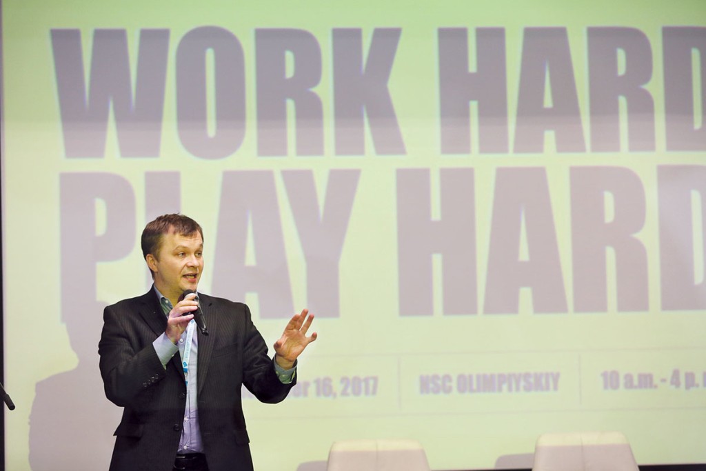Tymofiy Mylovanov, VoxUkraine co-founder and Kyiv School of Economics president, tells Kyiv Post Employment Fair visitors that Ukrainians must compete harder than people from other nations to succeed internationally. 