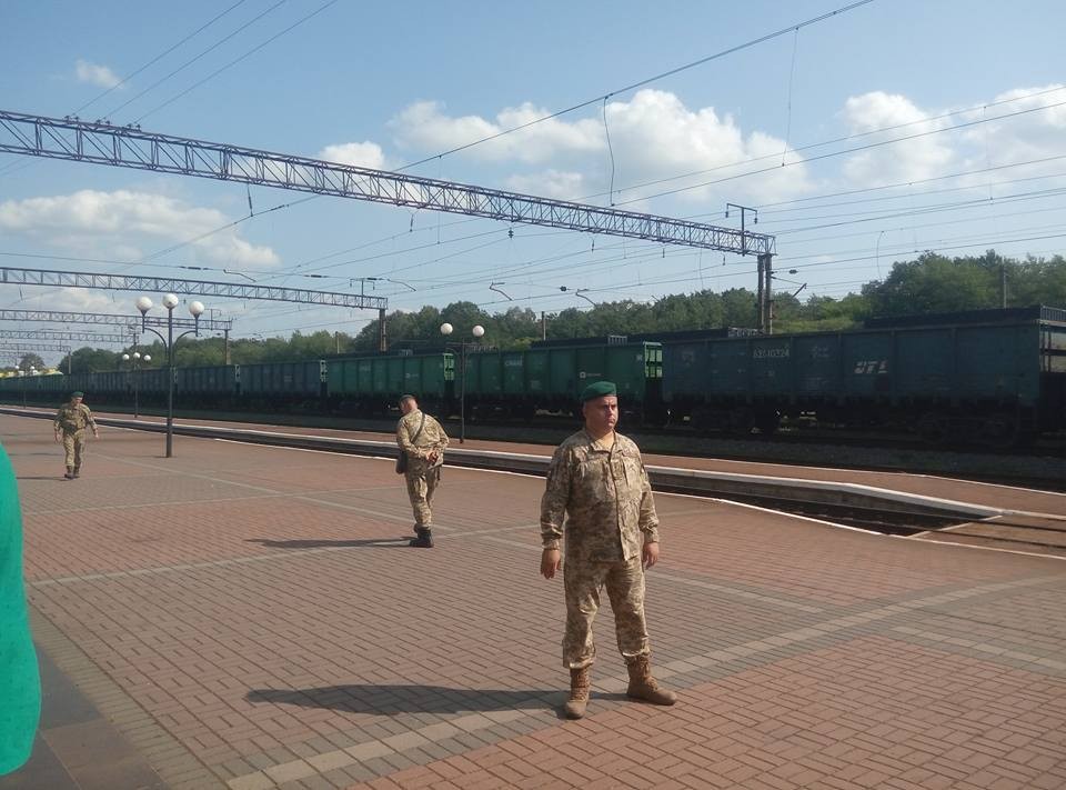 Ukrainian border guards stand on the platform at Mostyska, a Ukrainian checkpoint where the train from Poland's Przemysl usually stops for a check-up, on Sept. 10.