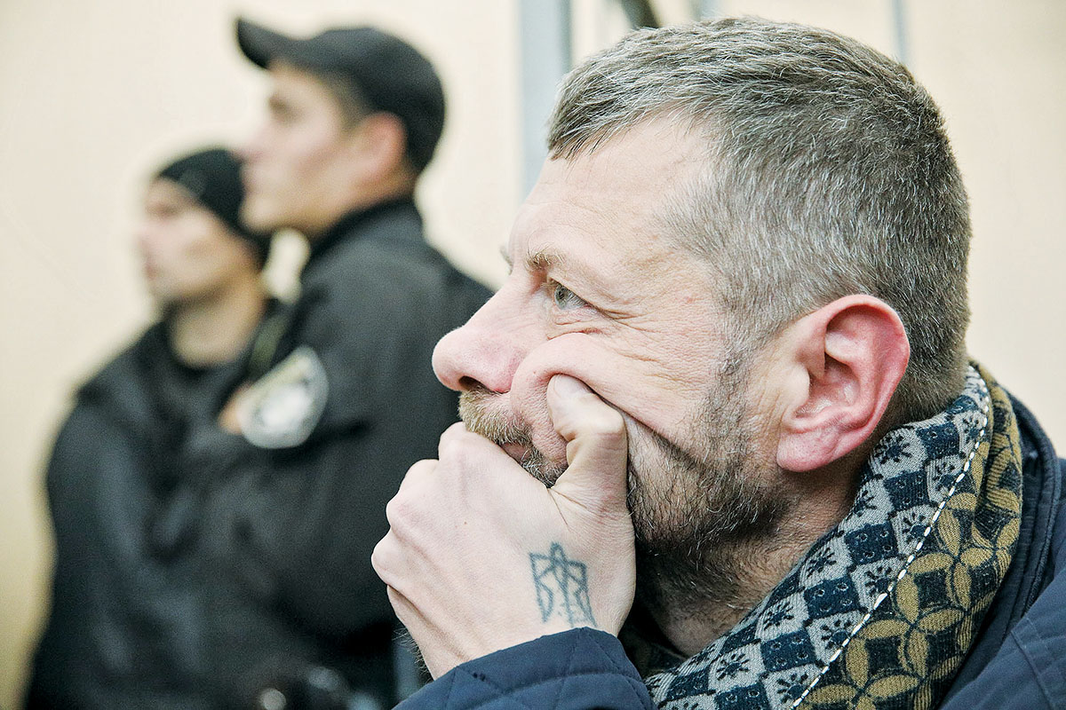 Lawmaker Ihor Mosiychuk attends a hearing on Mykola Kokhanivsky, leader of the OUN Battalion, at Kyiv's Svyatoshynsky court on Oct. 24. The murder attempt on Mosiychuk could be linked to the conflict between Kokhanivsky, who was backed by Mosiychuk, and Ruslan Kochmala, at whom Kokhanivsky has shot. (Volodymyr Petrov)