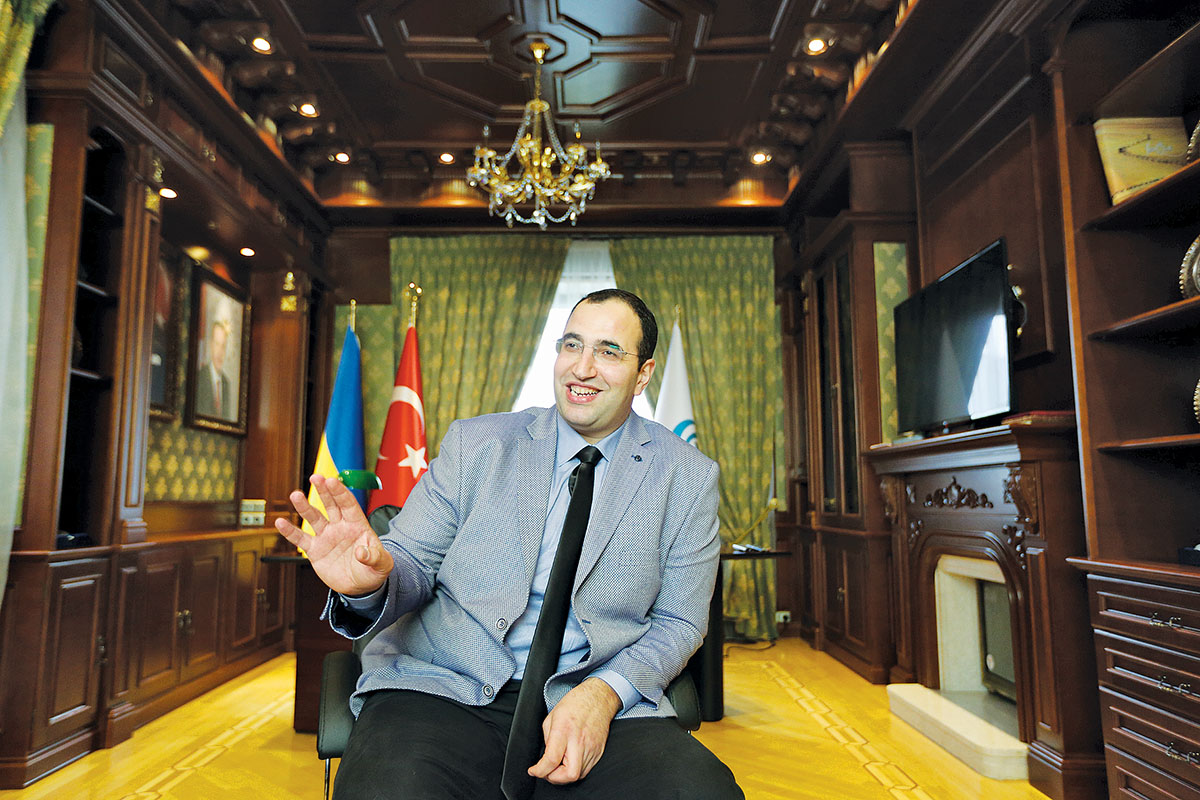 Over Turkish coffee and Turkish delight in his office, Yunas Emre Institute director Ender Korkmaz speaks with the Kyiv Post on Oct. 24. (Kostyantyn Chernichkin)