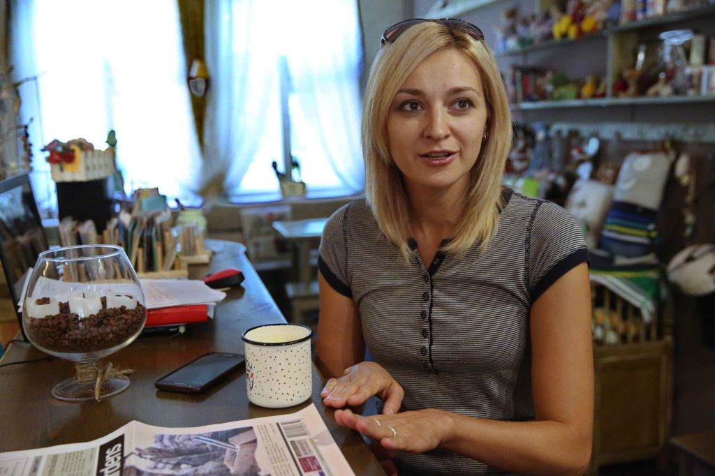 Julia Cherkasova, a co-owner of Prosto Kava cafe in Sloviansk, speaks to the Kyiv Post journalist on Aug. 16. (Volodymyr Petrov)