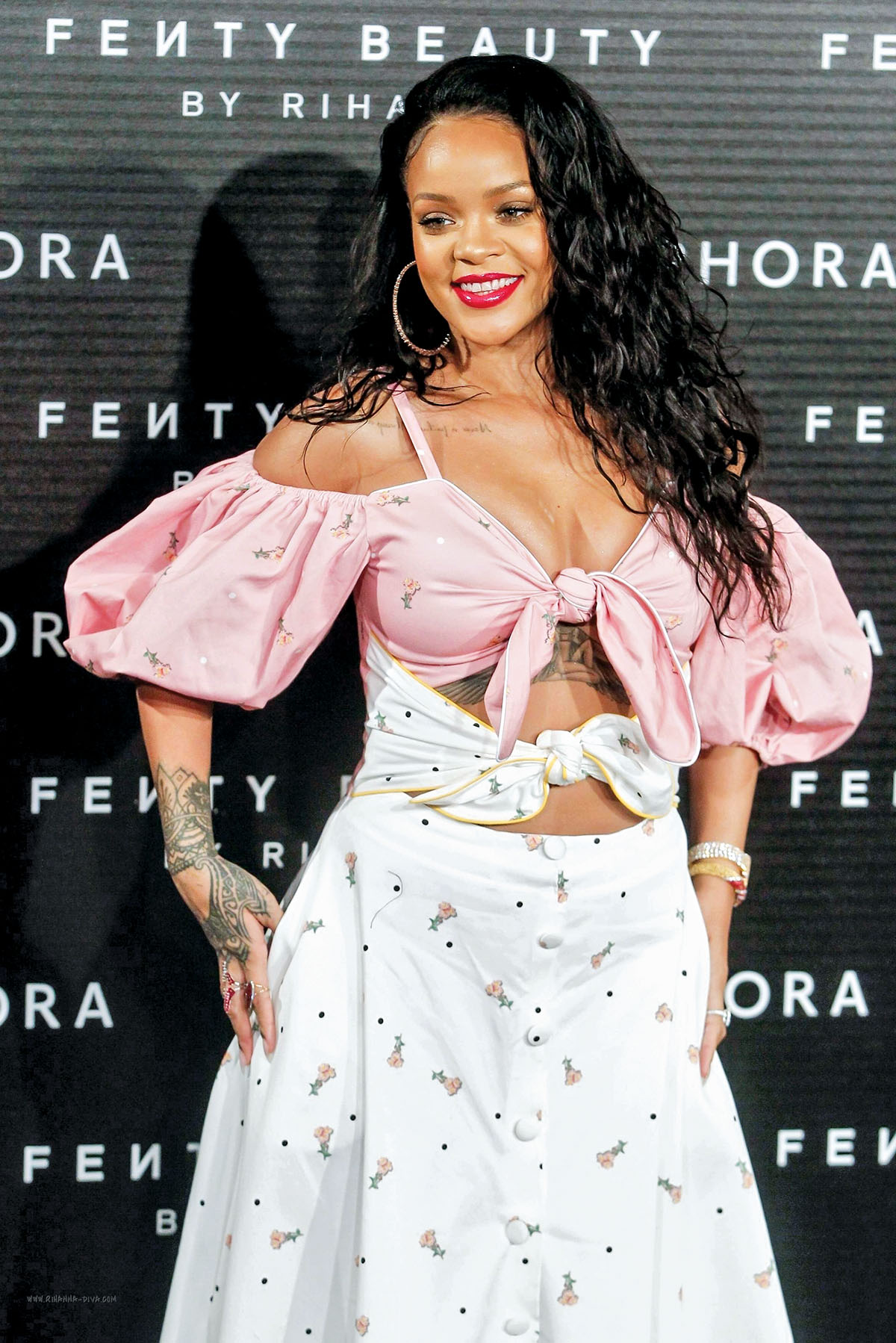 Pop icon Rihanna wears a skirt and top by Ukrainian designer Marianna Senchina during a photo call in Madrid on Sept. 23. 