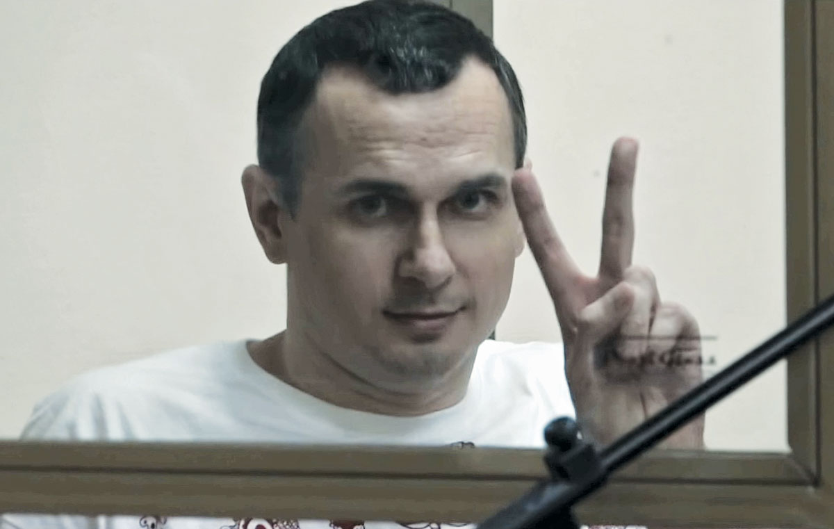 In "The Trial: The State of Russia vs. Oleg Sentsov," Ukrainian filmmaker Sentsov gestures during a court hearing. Russia has imprisoned him for three years for opposing the Kremlin's annexation of Crimea. (Courtesy)