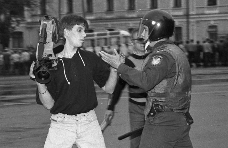 A police officer argues with a TV cameraman trying to film on a street in Kyiv in July 1995. 1990's brought greater freedom of speech after the 1991 collapse of the Soviet Union. But journalists, had to fight for their rights. Police and criminal gangs were the main dangers for journalists back them. 