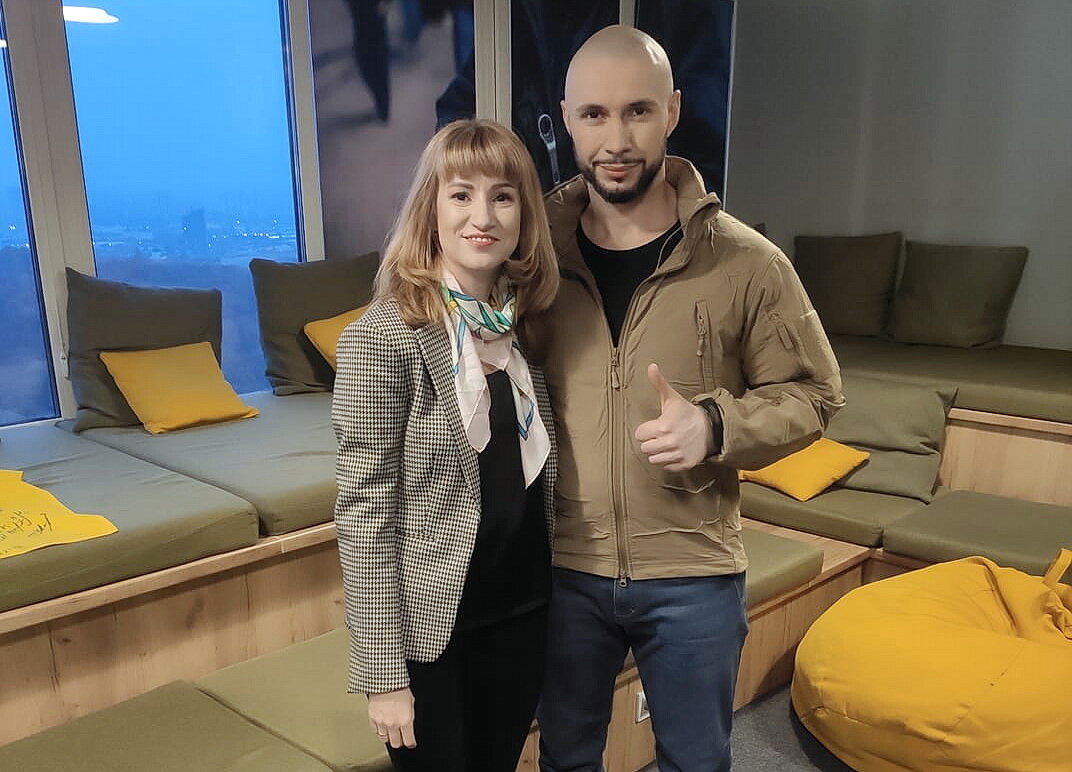 Ukrainian journalist Olga Tokariuk with Vitaly Markiv. 